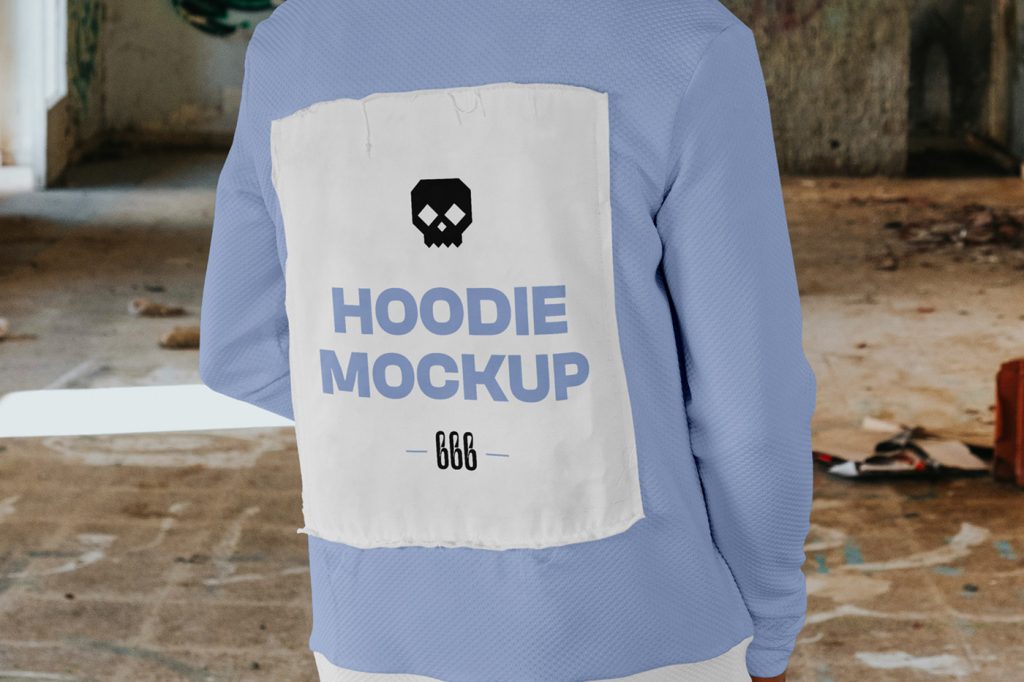Front view, standing men backwards wearing hoodie mockup with typography design between dirty space area.
