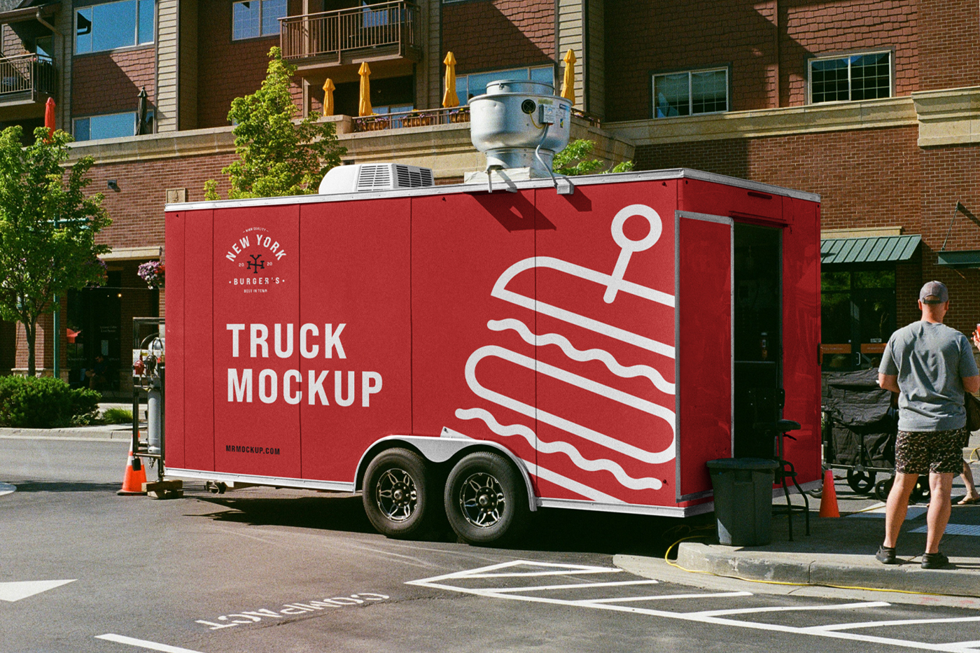 Standing red truck trailer mockup on the street with logo and white design in front of the building.