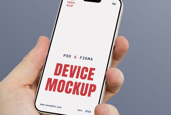 Hand holding iPhone 16 Pro Mockup in front of the bright navy color wall.