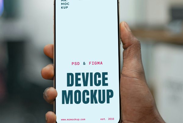 Hand holding iPhone 16 Pro Mockup in front of the strong blurred office.