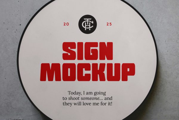 Front view, circle sign mockup with black frame based on a concrete wall with nice strong black and red typography design.