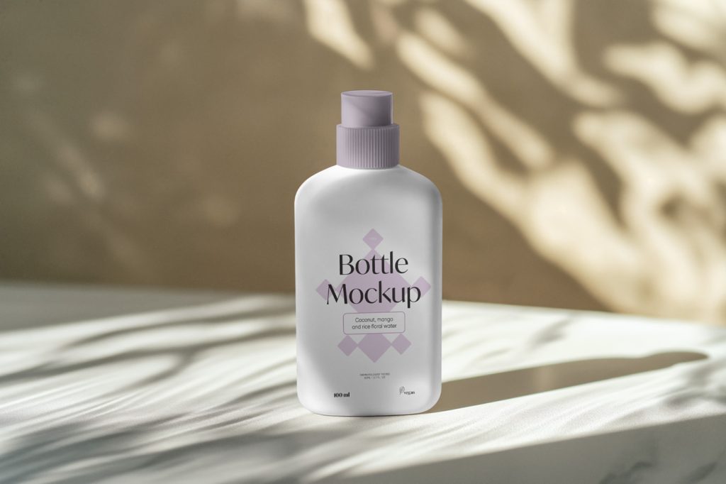Front view standing cream plastic bottle mockup with sensual and delicate graphics and visible yellow wall in the background.