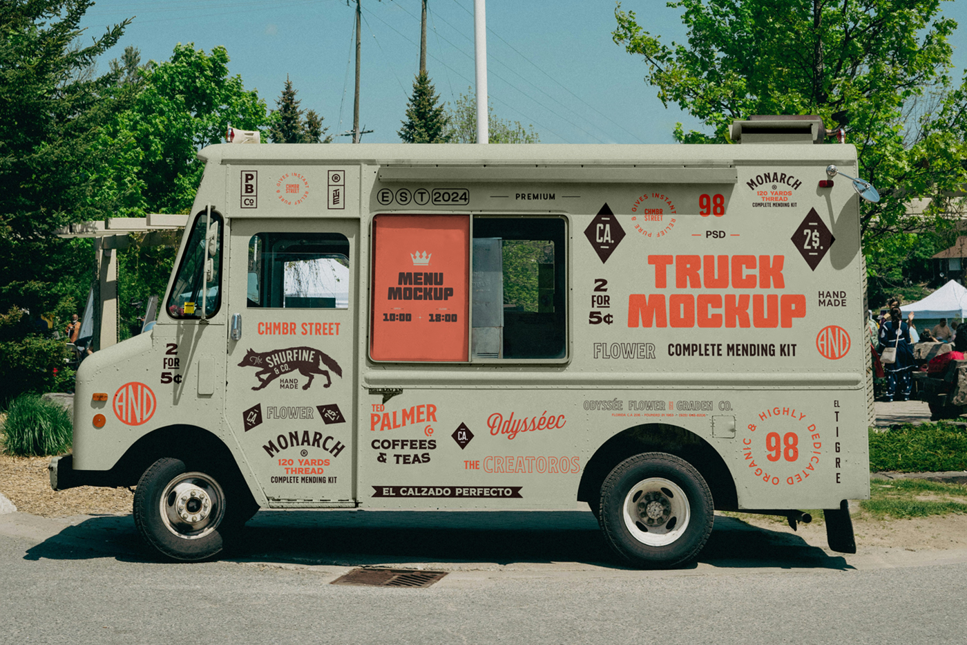 Front view, vintage food truck mockup with a lot of colorful graphics design on the bodywork standing in the parking lot near the festival