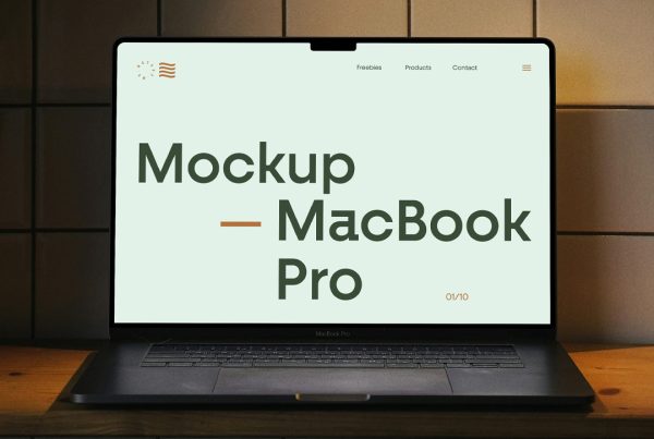Front view, open space gray MacBook Pro Mockup standing on the wooden table.