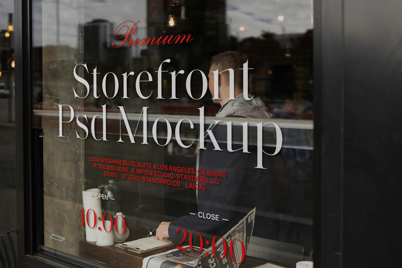 Front view, at an angle of 45 degrees, clean glass Storefront Cafe Mockup with colorful graphics and red strong typography.