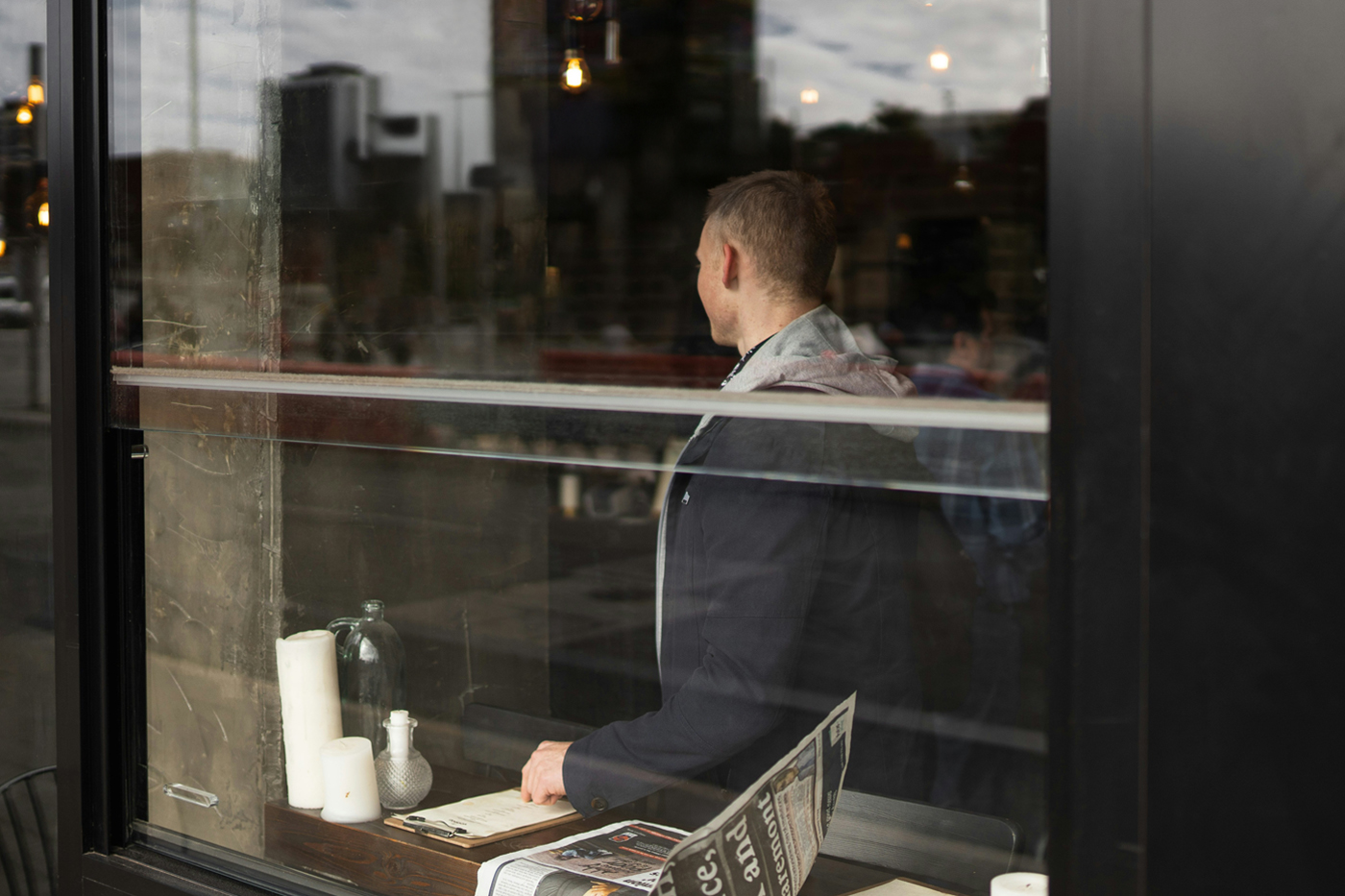 Front view, at an angle of 45 degrees, clean transparent glass Storefront Cafe Mockup.