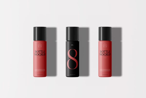 View from above, three slender ones bottle mockups with black and red typography design laying on the white floor.