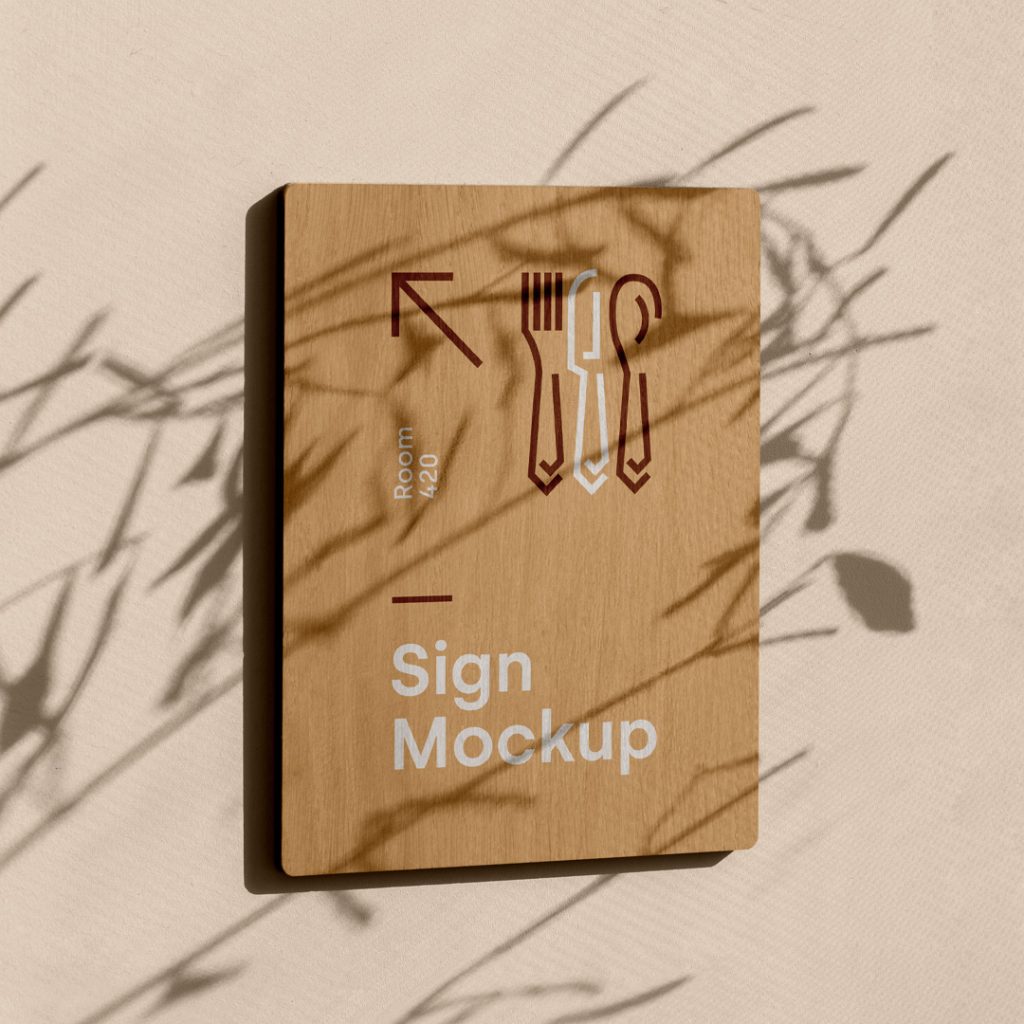 Rectangle Wood Sign Mockup attached to the bright orange wall.