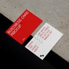View from above, two outdoor business card mockups with red and white colors, geometric typography design, laying on the concrete.