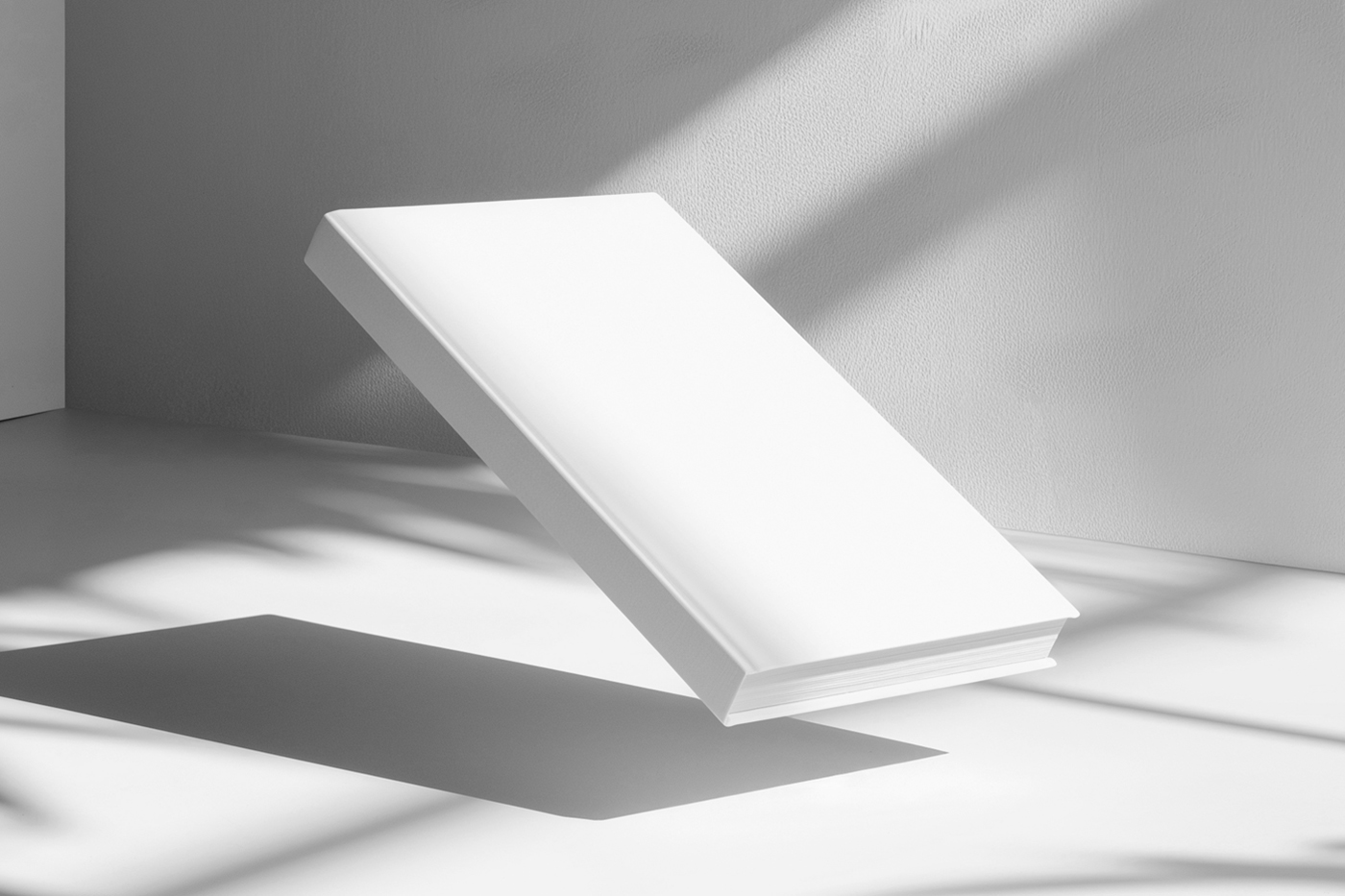 Front view, levitating hardcover book mockup over the white floor, with visible white color walls behind.