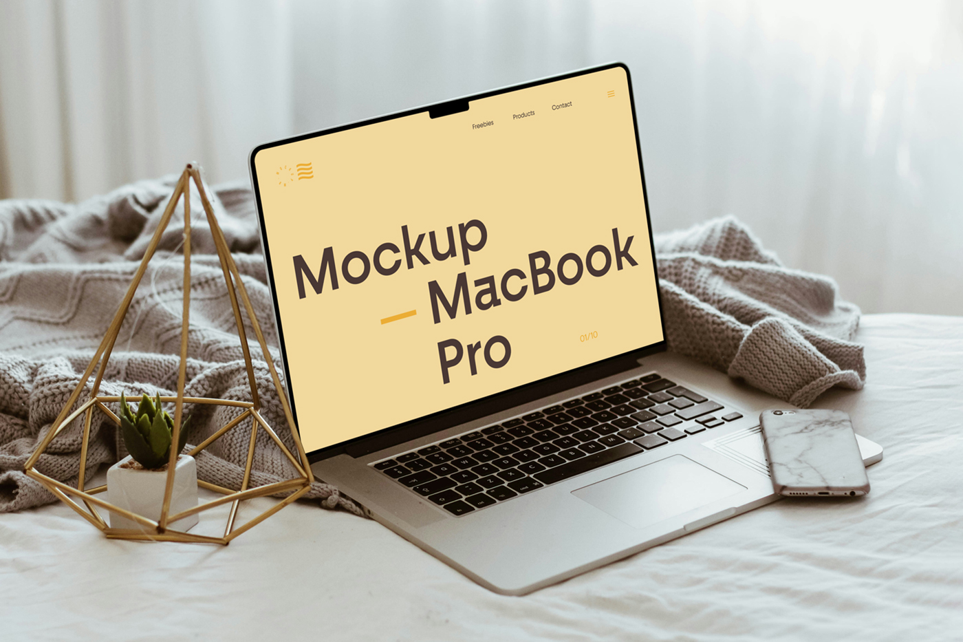 Side view, open silver MacBook Pro Mockup with decoration accessories laying in the bedroom.