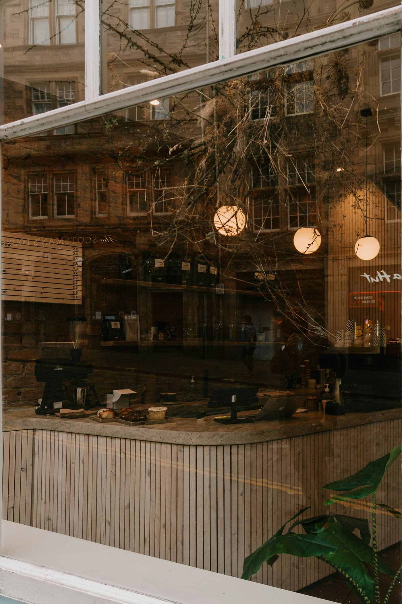Front view, at an angle of 45 degrees, clean glass Restaurant Storefront Mockup.