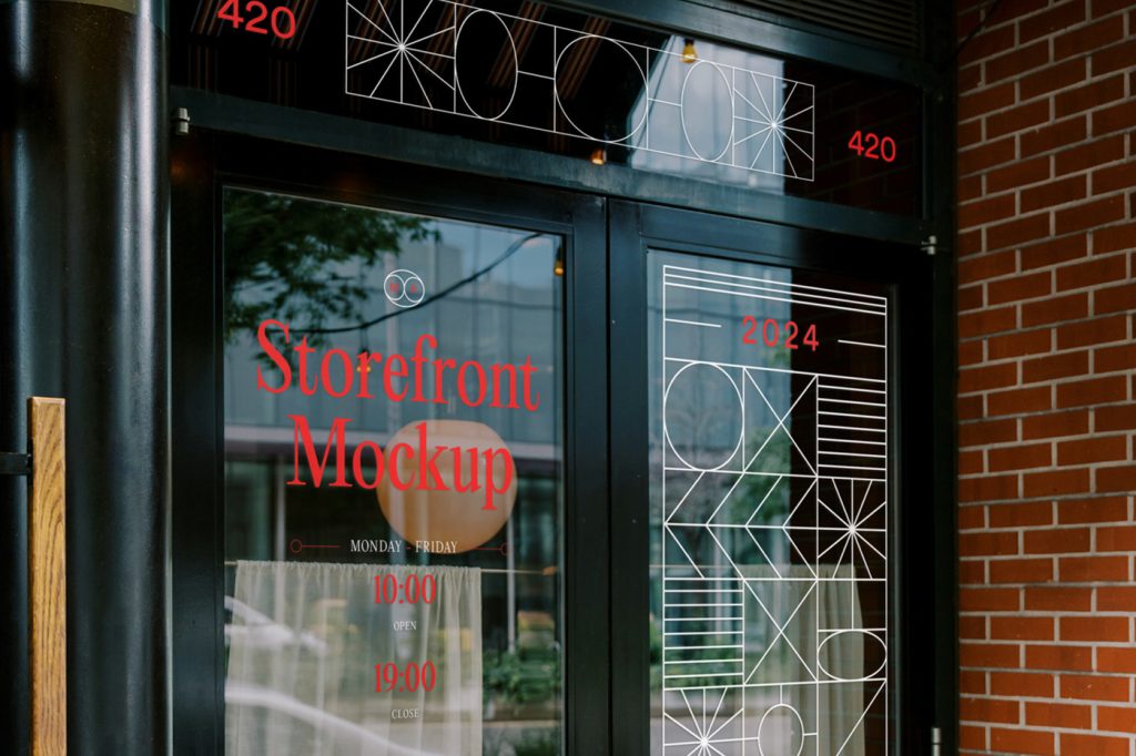 Front view, restaurant storefront mockup with vertical tinted windows, white graphics and red delicate serif typography.