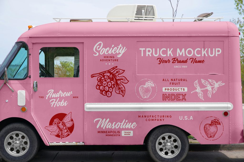 Front view, vintage food truck mockup with a lot of colorful graphics design on the bodywork standing in the parking.