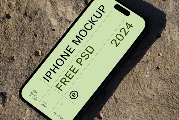 View from above, iPhone 16 Pro Mockup laying on the rock.