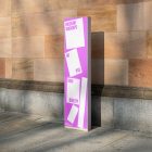 Front view, Stand Mockup with white and pink design standing before a big wall. Scene from our Museum Mockups product.