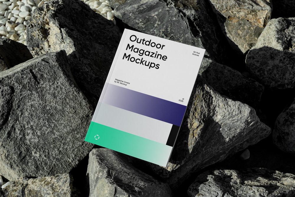 View from above, outdoor magazine mockups with three gradient shades and strong typography design, lying on a massive stone.