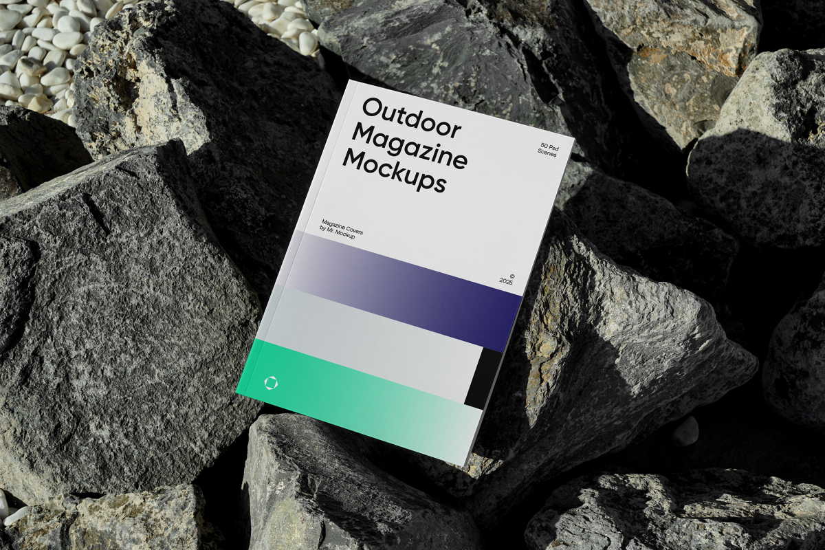 View from above, outdoor magazine mockups with three gradient shades and strong typography design, lying on a massive stone.