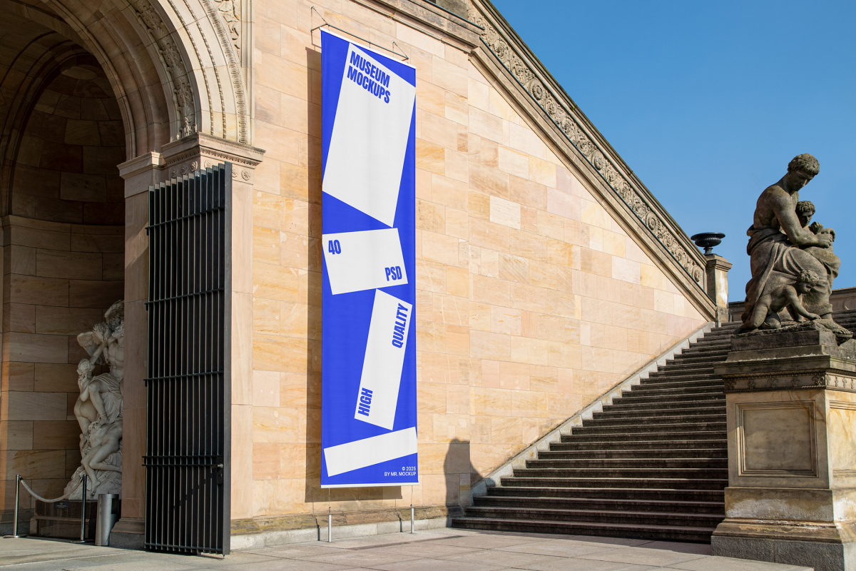 Front view, Vertical Flag Mockup with white and blue design attached to the old architecture building wall. Scene from our Museum Mockups product.
