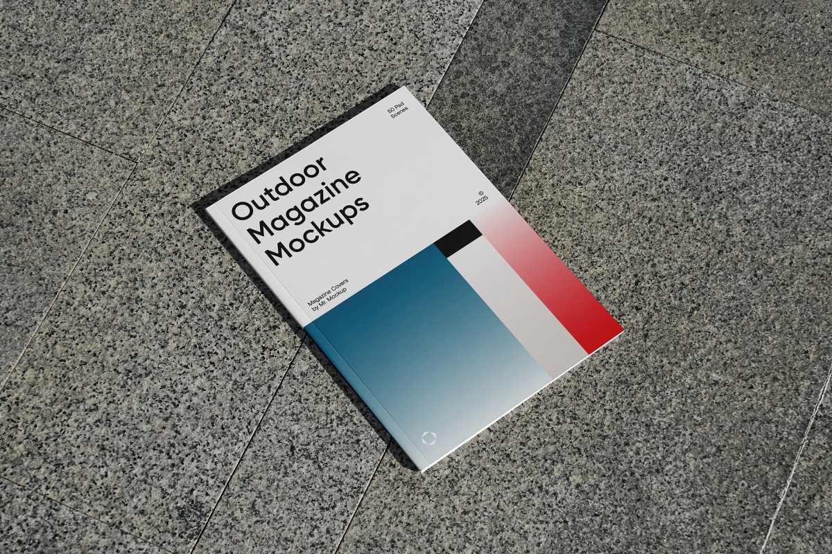 View from above, a single outdoor magazine mockup with three gradient shades and strong typography design lying on the marble background.