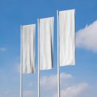 Front view, Three White Vertical Flag Mockups against the sky background. Scene from our Museum Mockups product.