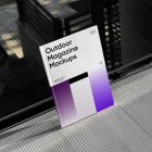 Front View, Outdoor Magazine Mockup with three gradient shades and strong typography design resists on glass.