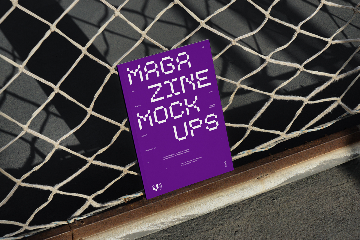 Front view, of outdoor magazine mockups with strong purple typography design resists on string net.