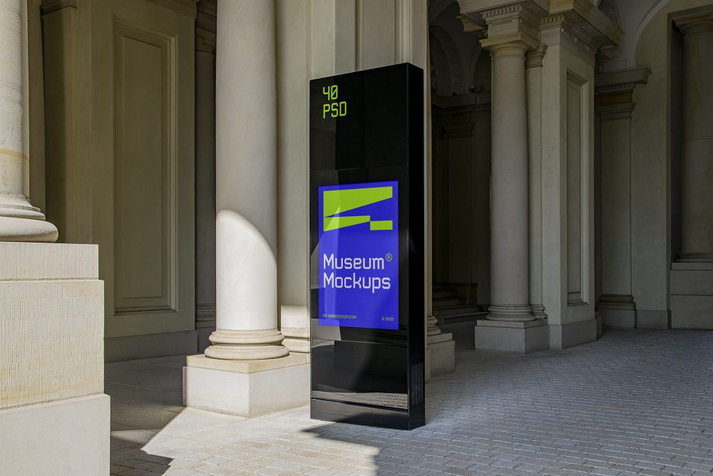 Front view, Monument Poster Mockup with neon green and purple design attached to the sidewalk between old architecture buildings. Scene from our Museum Mockups product.