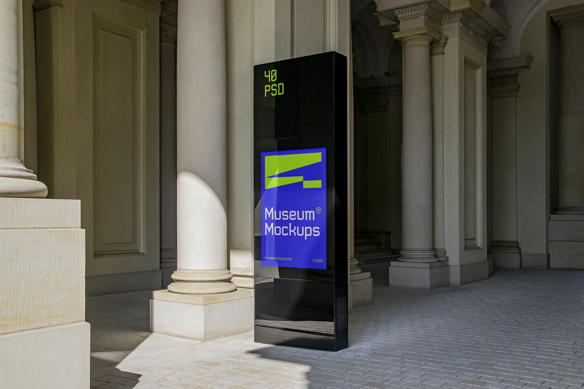 Front view, Monument Poster Mockup with neon green and purple design attached to the sidewalk between old architecture buildings. Scene from our Museum Mockups product.