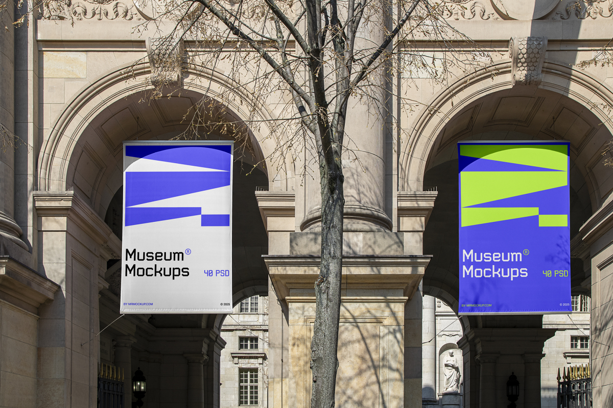 Front view, Two Hanging Banner Mockup with white, purple, and neon green geometric designs holding on to ropes attached to the building. Scene from our Museum Mockups product.