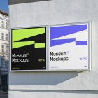 Front view, Two Banner Mockups with white, purple, and neon green geometric designs attached to the building elevation. Scene from our Museum Mockups product.