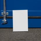 Front view, of a white outdoor magazine mockup resist on the blue container color.