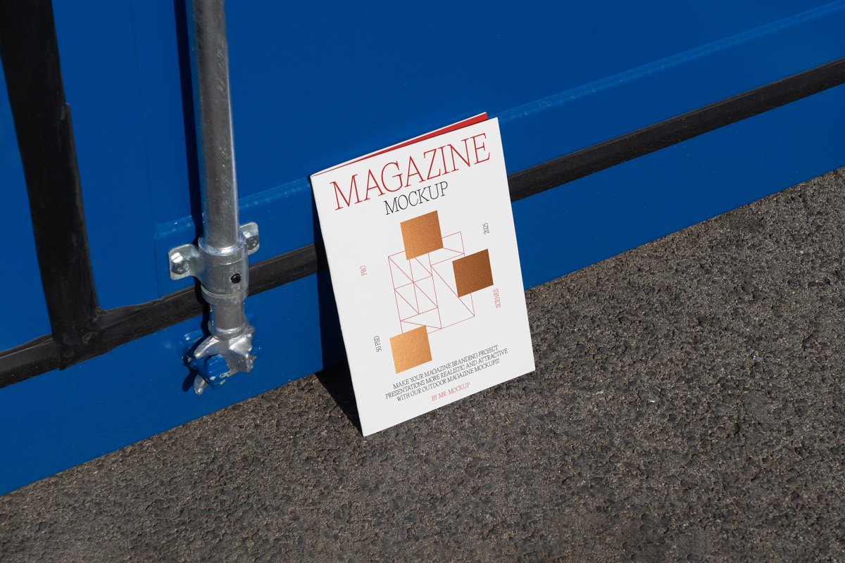 Front view, of outdoor magazine mockups with simple minimalist design in black and red color, serif typography, and square foil pattern resist on the blue container color.