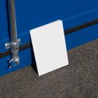 Front view, of a white outdoor magazine mockup resist on the blue container color.