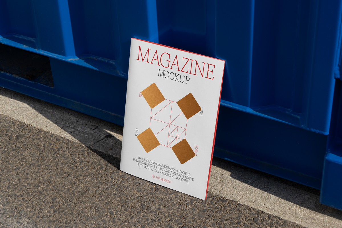Front view, of outdoor magazine mockups with simple minimalist design in black and red color, serif typography, and diamond foil pattern resist on the blue container color.