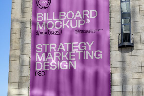 Front view, Vertical in Pink color Billboard Mockup with strong white and black typography design hanging on the building wall.