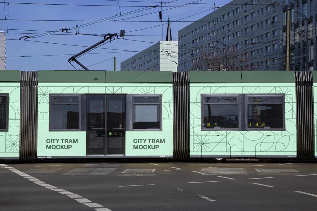 Front View side of City Tram Mockup with two green tints and geometric patter, strong typography against the city view.