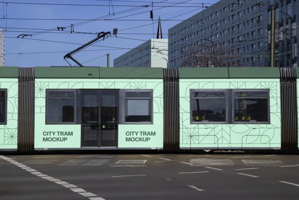 Front View side of City Tram Mockup with two green tints and geometric patter, strong typography against the city view.