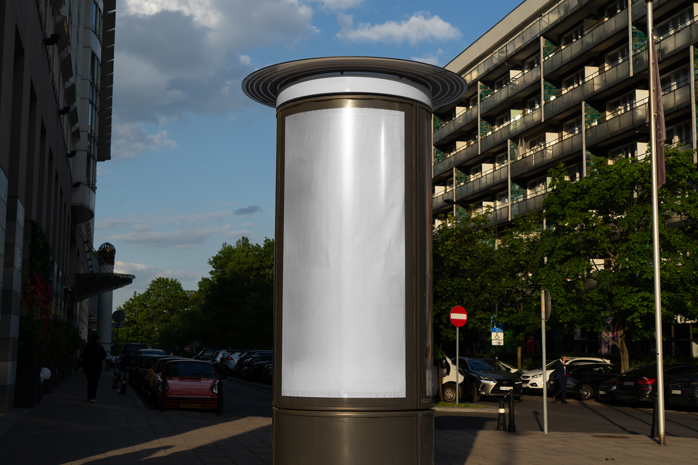 Front view, a White Outdoor Billboard Mockup against the city view.