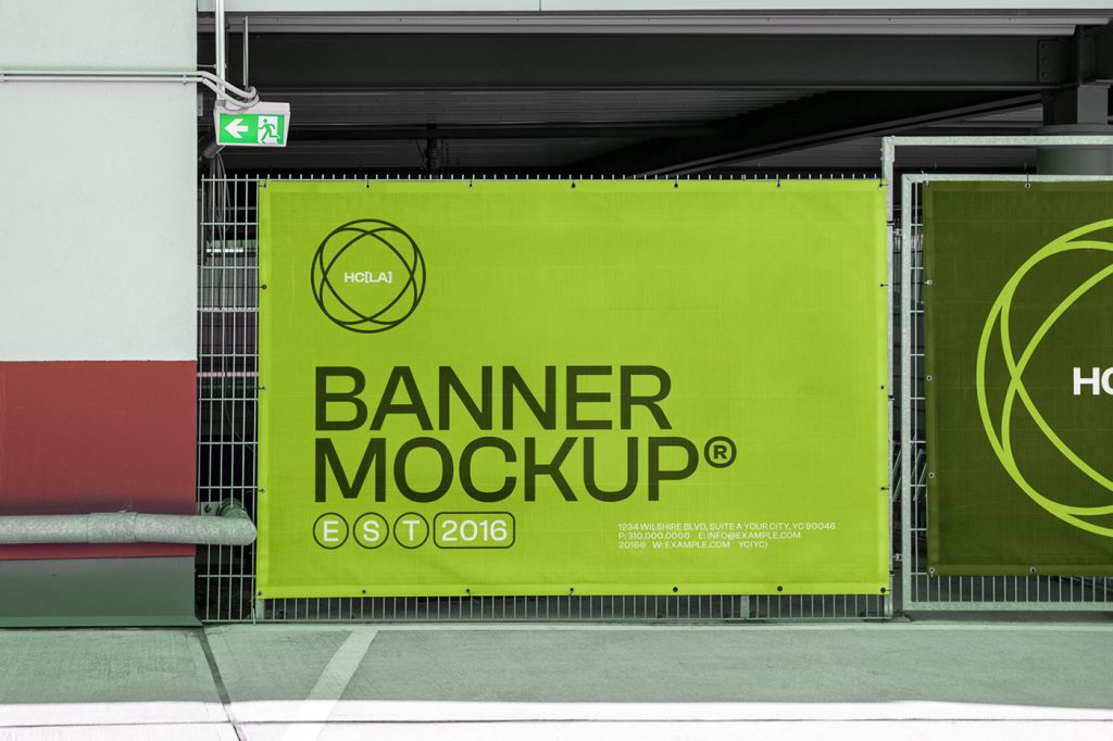 Front view, Urban Banner Mockups in green color with strong typography design hanging on the parking fence.