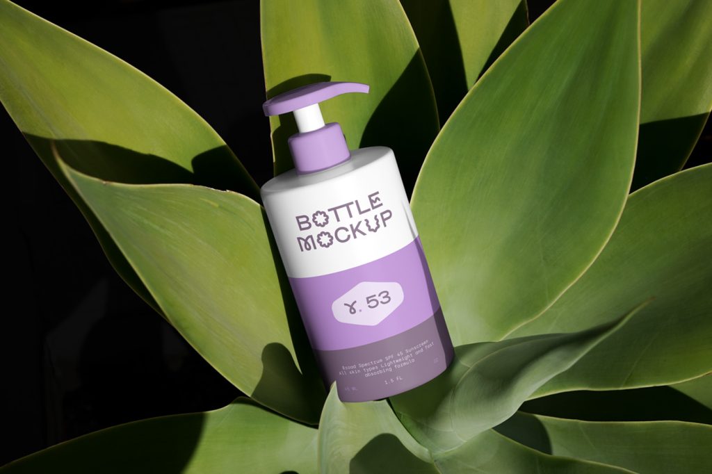Front view, Laying Cosmetic Bottle Mockup with a colorful design between the massive leafs.
