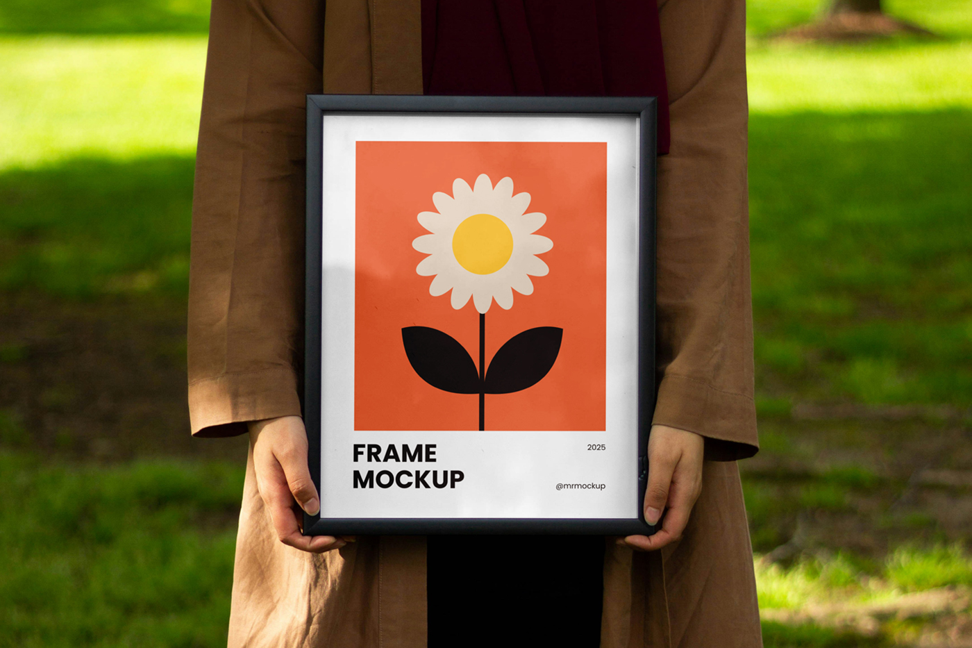 Front view, women holding a framed poster mockup in hands with simple illustration design against the background of the park.