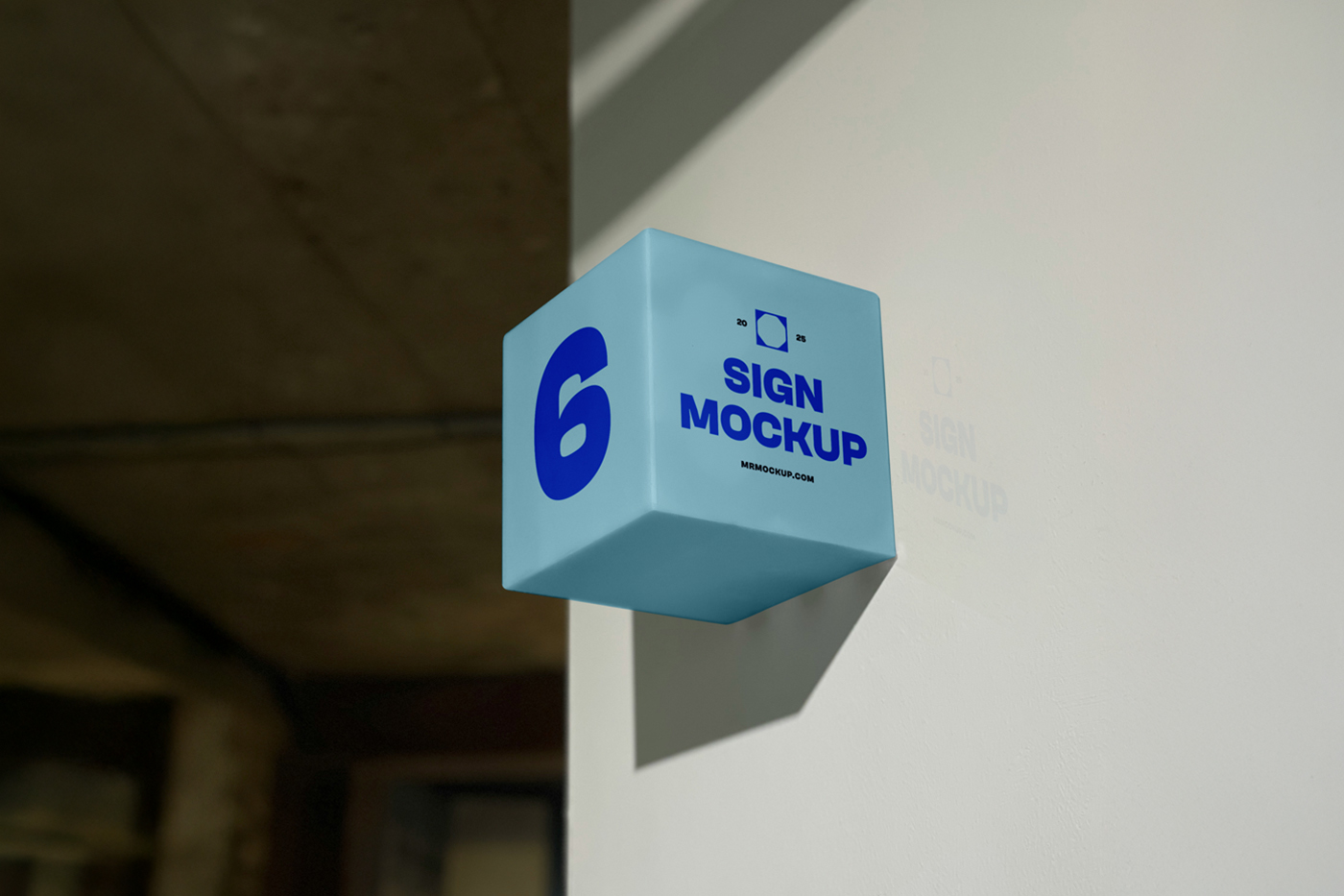 Front view, blue square sign mockup with simple typography design in navy and black color attached to the white wall with reflection viewed.