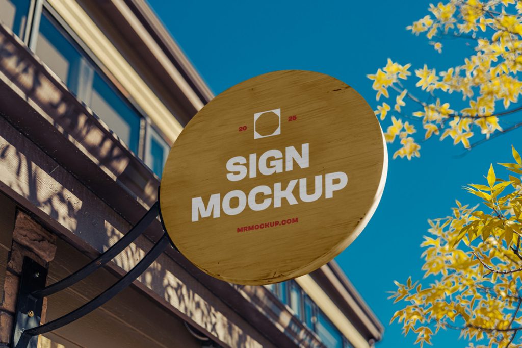Front view, wooden sign mockup with strong, simple typography design attached to the building elevation.