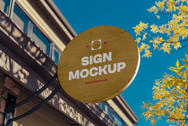 Front view, wooden sign mockup with strong, simple typography design attached to the building elevation.
