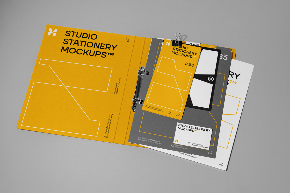 Front view, stationery mockups. Open yellow binder mockup with a white A4 card mockup, white business card mockups, yellow leaflet mockup, and black square card mockup lying on it, strong geometric typography design in yellow, black, and white colors. Everything is lying on a bright gray background.