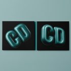 Viewed from above, CD Digipack Mockups presents a green and black disc package with 3D graphics lying on the green background.