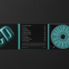 Viewed from above, CD Digipack Mockups presents green and black disc packaging with nice white serif typography and 3D graphics lying on the black background.