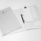 Front view, stationery mockups. Open white binder mockup with a white A4 card mockup and white business card mockup lying on it. Everything is lying on a white background.