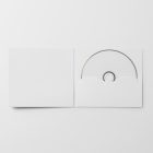 Viewed from above, CD Digipack Mockups presents open white disc packaging and a white disc lying on the white background.
